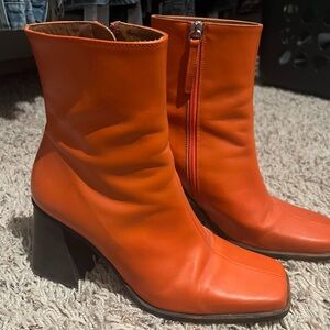 Bright orange boots